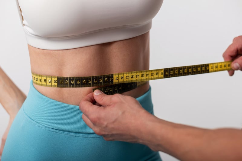 Prise de mesure &agrave; la taille